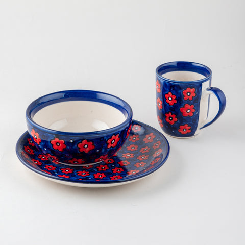 Floral ceramic breakfast set of 3 including a ceramic mug, bowl, and plate, handcrafted in Khurja and displayed on a plain background