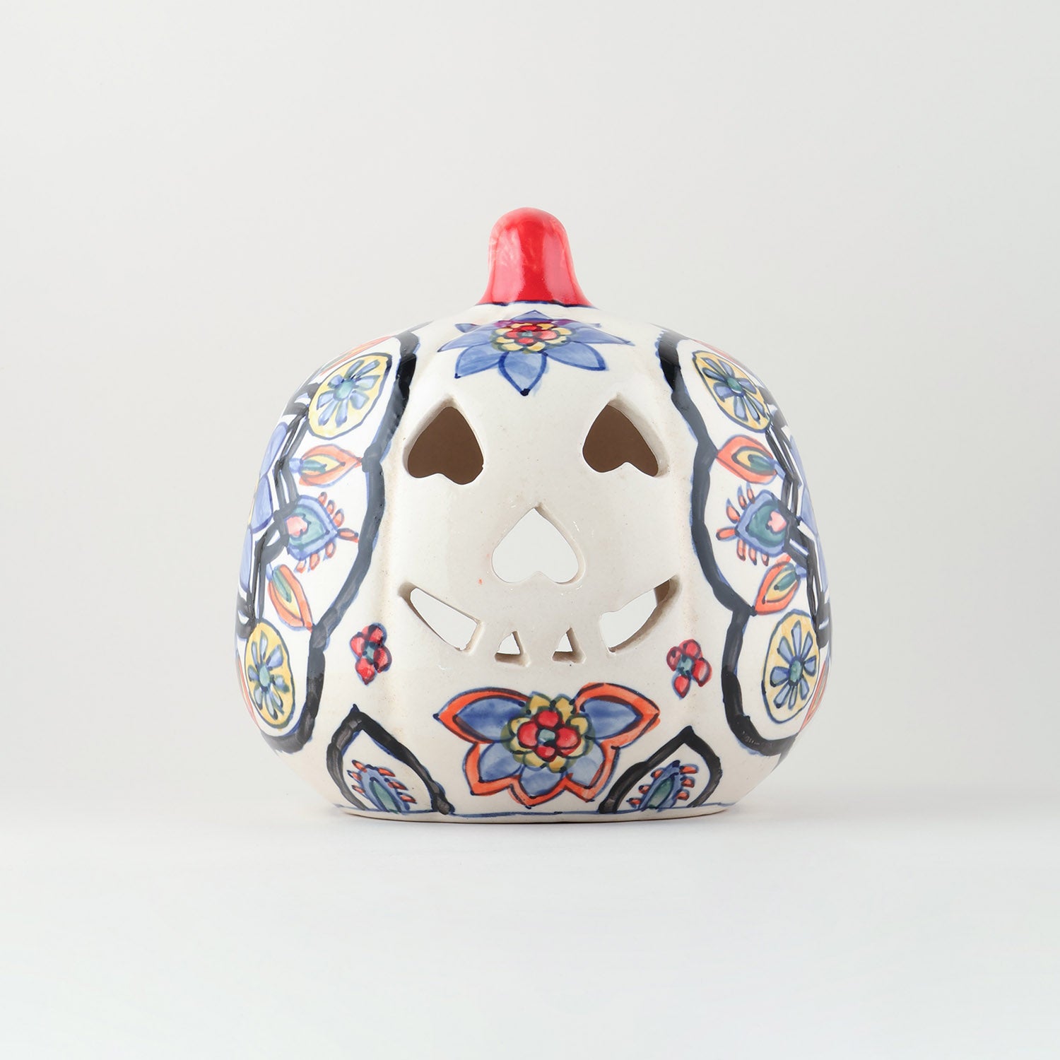 Hand-painted floral ceramic pumpkin tea light holder in vibrant multi-colour tones handcrafted in Khurja