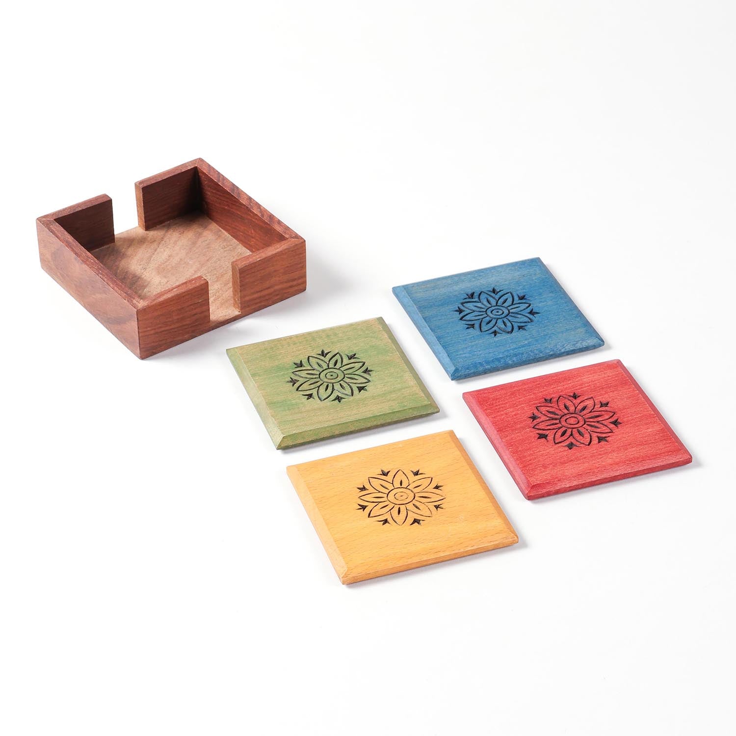 Angled view of the Floral wooden coaster set of 4 with a matching holder for organised table storage.