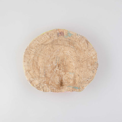 Back view of a handmade Ganesha Chhau wall mask showing the handcrafted clay, cloth, and paper construction with hanging support
