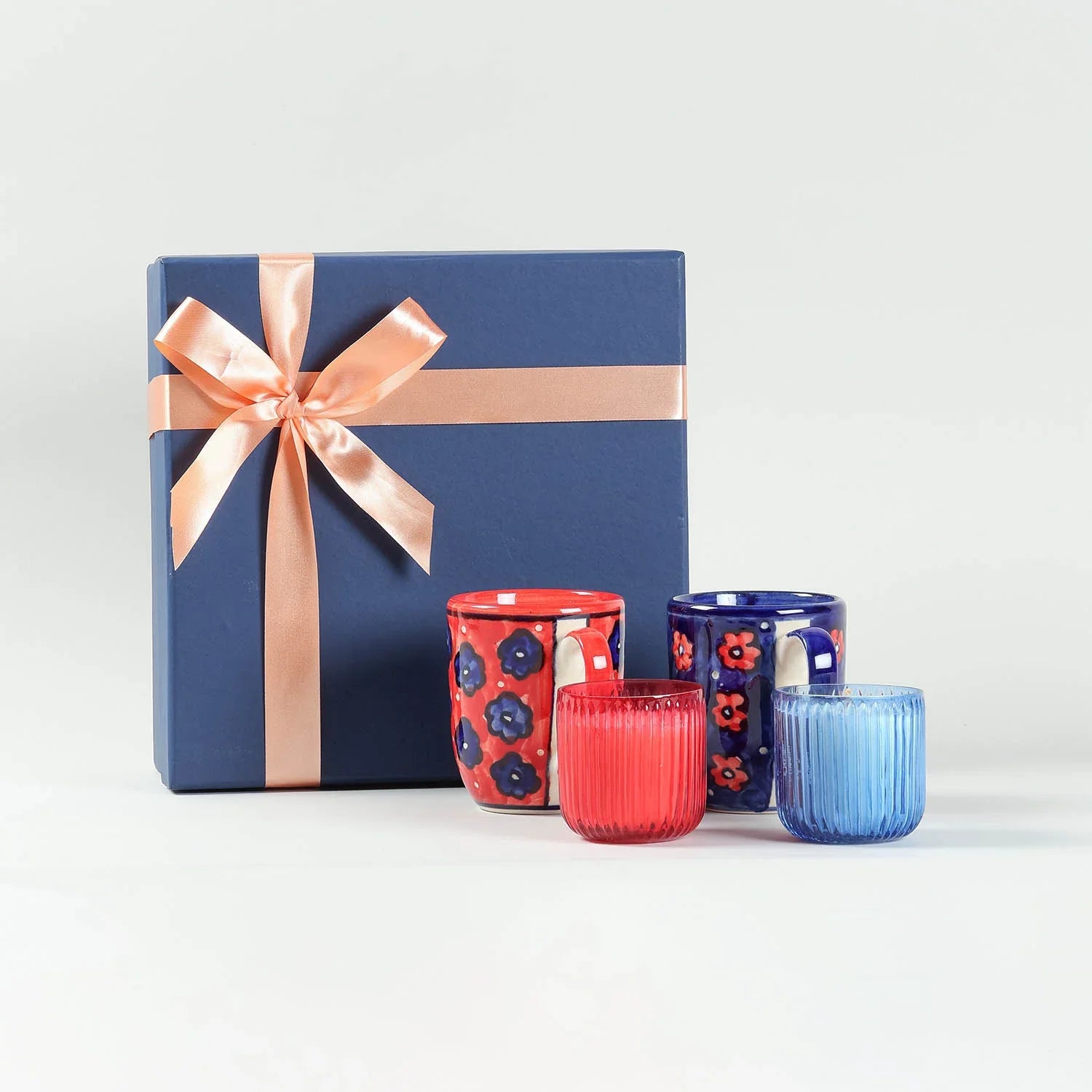 Premium satin-lined gift box with hand-painted coffee mugs and scented candles