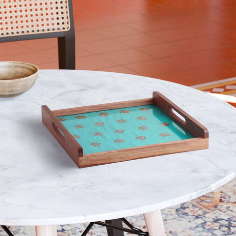 Square sheesham wood serving tray with green chanderi fabric and golden gota patti floral design, styled for festive serving and home decor