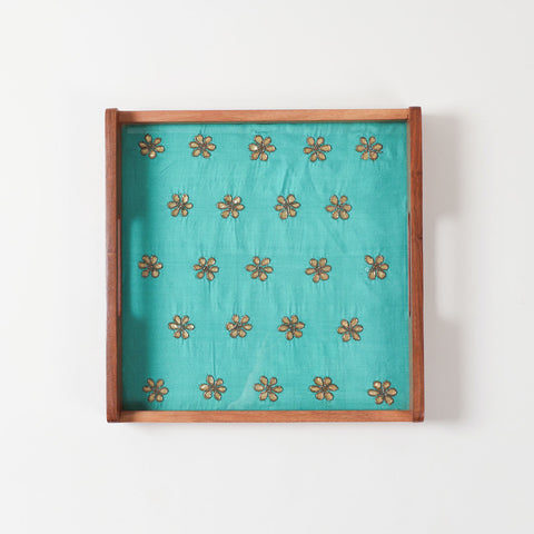 12 inch square wooden serving tray with green fabric base, golden gota patti work, and glass top finish on sheesham wood frame