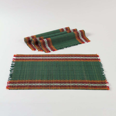 Green natural fibre placemats crafted from Madhurkathi grass, displayed as a dining table mat set of 4 with a handwoven texture