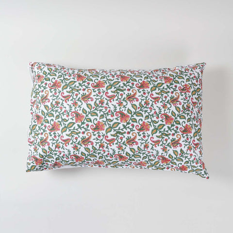Single cotton pillow cover featuring hand block printed paisley jaal design in green, pink, and mustard tones on a white base
