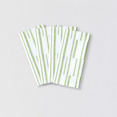 Set of four cotton dining table napkins with handcrafted green stripe pattern and everyday functionality
