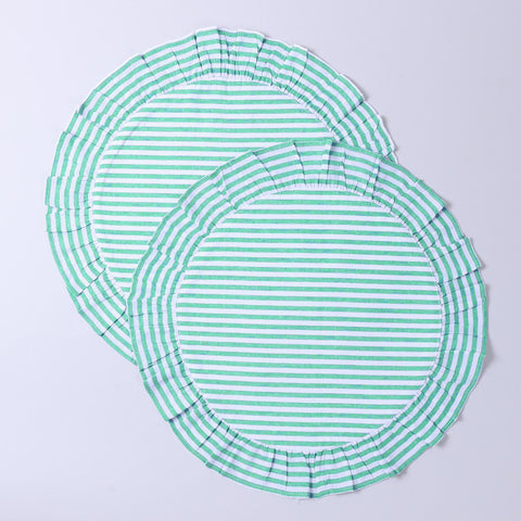 Pair of round cotton placemats featuring green stripes and decorative frilled edges displayed on a plain background