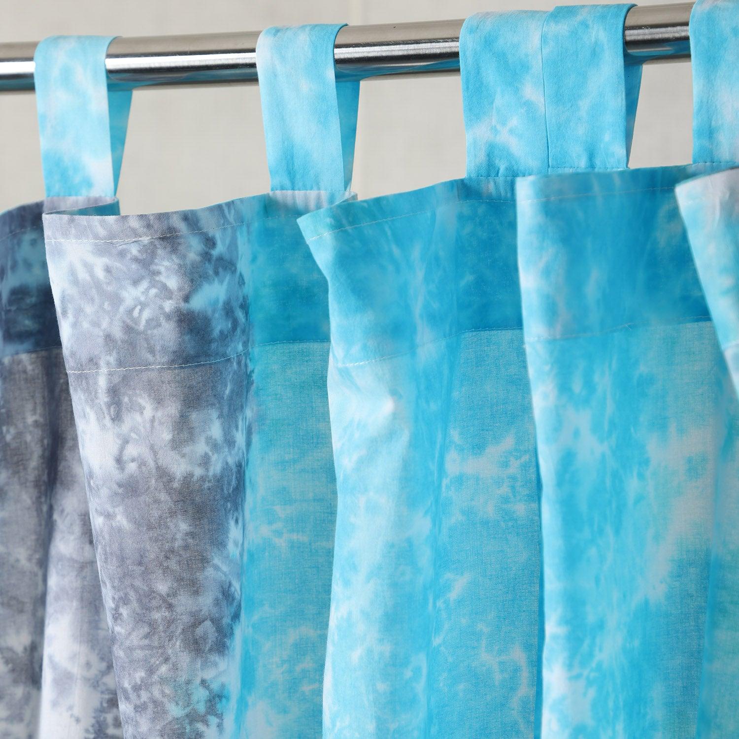 Grey and blue tie-dye mulmul cotton tab top door curtain with a soft, lightweight drape