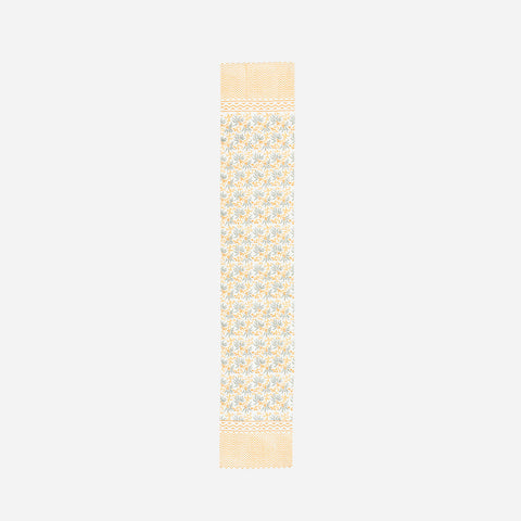 Full size cotton table runner with grey floral motifs and decorative orange yellow borders