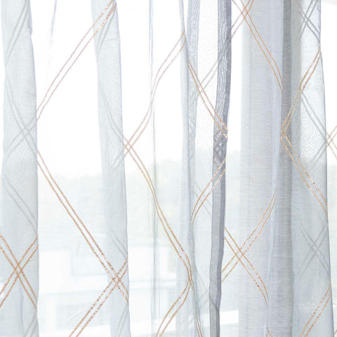 Grey Chanderi sheer curtain gently filtering sunlight to create a soft and airy ambience