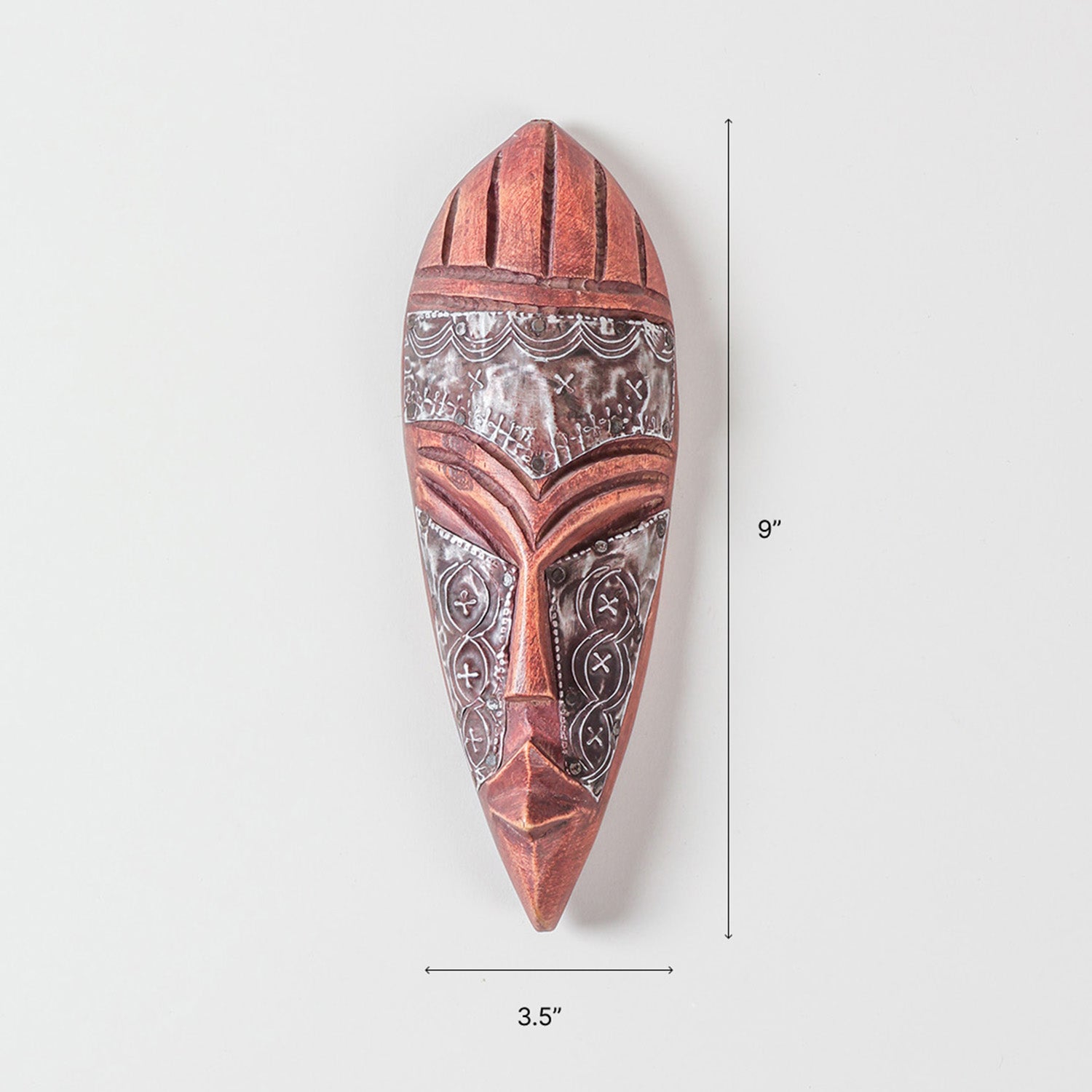 Size chart of hand carved wood and metal African mask showing dimensions of 9 x 3.5 x 1.5 inches