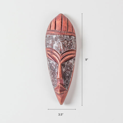 Size chart of hand carved wood and metal African mask showing dimensions of 9 x 3.5 x 1.5 inches