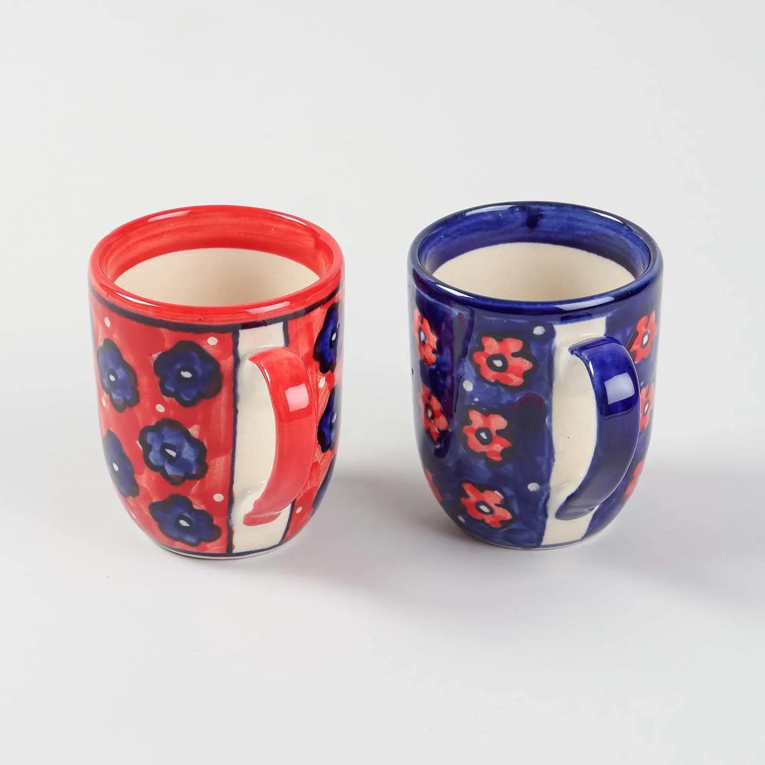 Hand-painted ceramic coffee mug set of 2 featuring floral designs inspired by Khurja ceramics