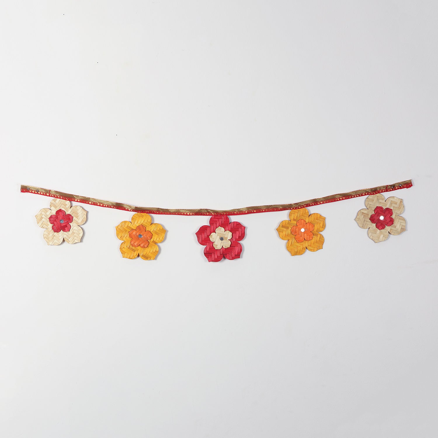Full view of a handcrafted horizontal bamboo flower toran