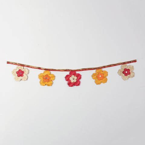 Full view of a handcrafted horizontal bamboo flower toran