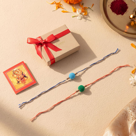 Handmade Cotton Yarn Crochet Bead Rakhi, beautifully presented in a festive gift box with satin ribbon, ready for Raksha Bandhan gifting