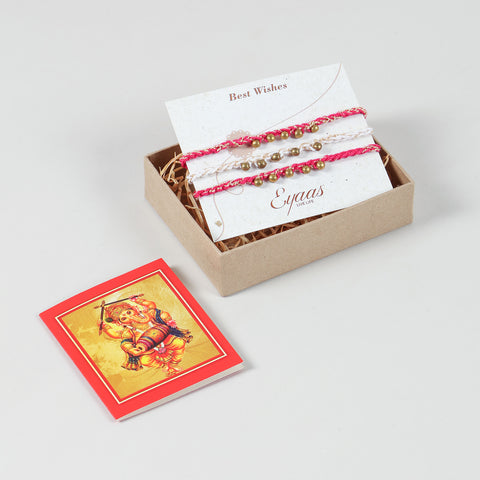 Handmade Crochet Brass Bead Rakhi neatly arranged inside a festive gift box, ready for gifting to your brother.
