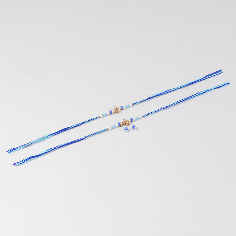 Full-length view of the Handmade Ganesh Rakhi & Lumba Set with Blue Beads for Bhaiya Bhabhi, showcasing the complete rakhi, lumba and handcrafted design