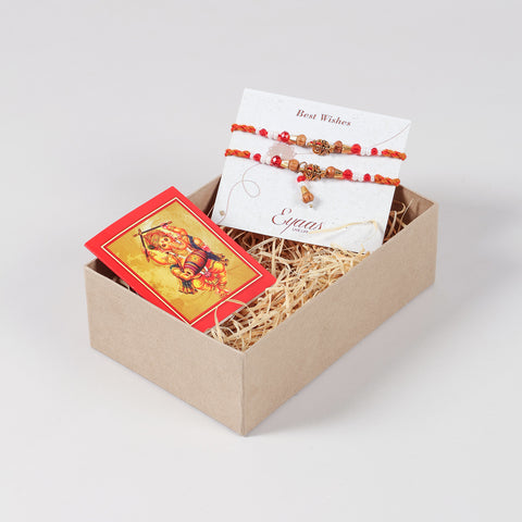 Handmade Om Rakhi & Lumba Set neatly arranged inside a decorative Raksha Bandhan gift box.