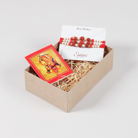 Handmade Rudraksha Rakhi Set of 3 neatly arranged inside a decorative Raksha Bandhan gift box.