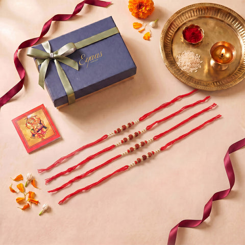 Handmade Rudraksha Rakhi for Brothers Set of 4, beautifully presented in a festive gift box for Raksha Bandhan gifting