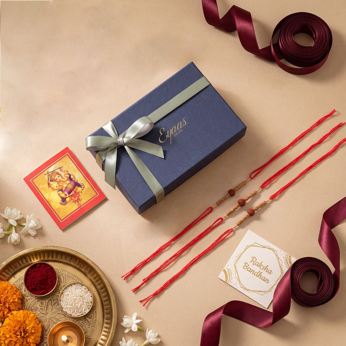 Handmade Rudraksha & Wooden Bead Rakhi Set of 3, beautifully presented in a festive gift box for Raksha Bandhan gifting.