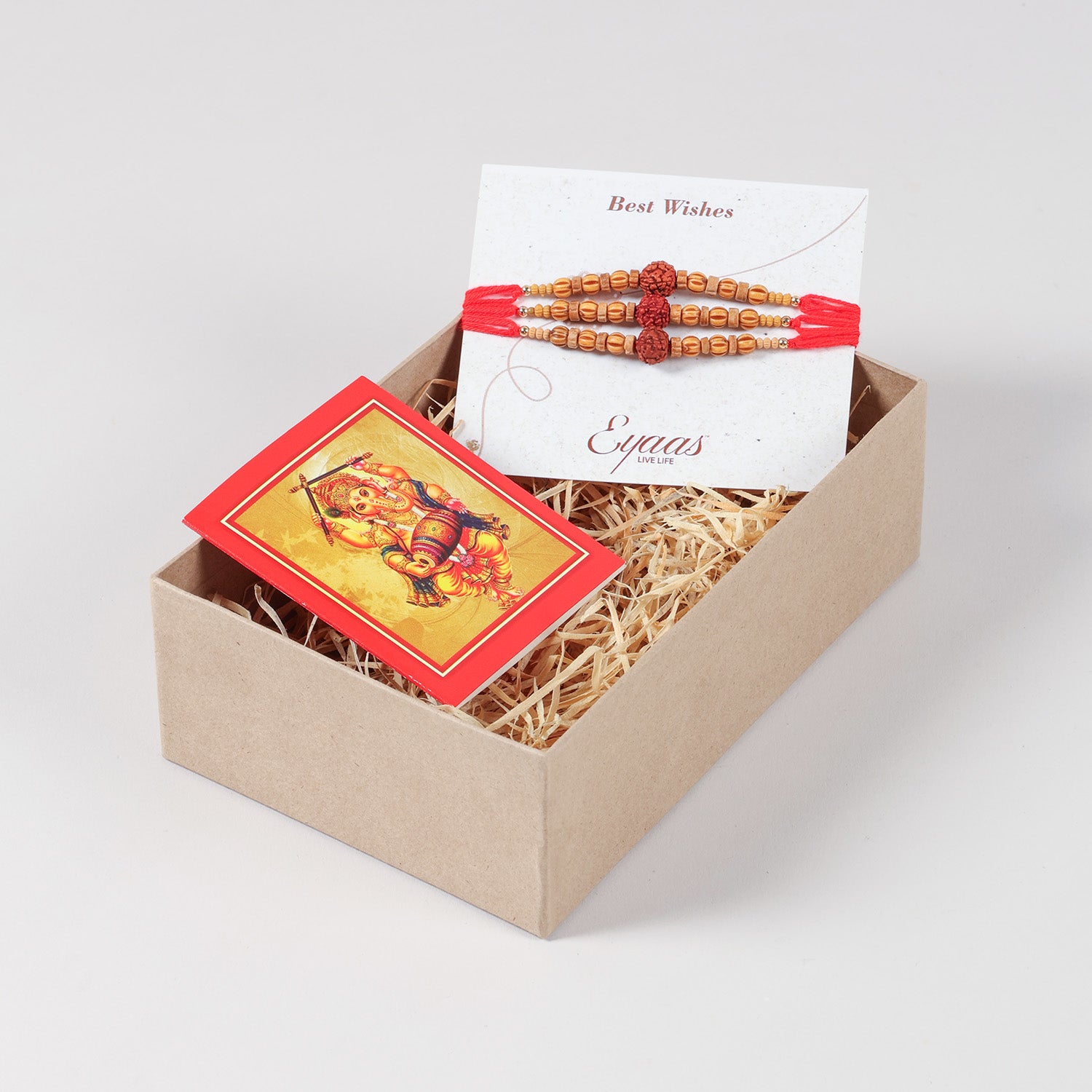 Handmade Rudraksha & Wooden Bead Rakhi Set of 3 neatly arranged inside a Raksha Bandhan gift box.