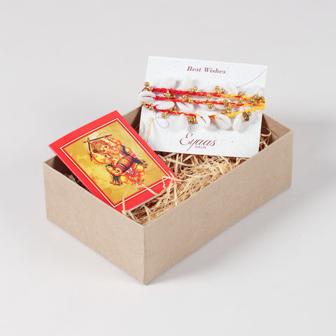 Handmade Sea Shells & Ghungroo Rakhi Set of 3 carefully arranged inside a festive Raksha Bandhan gift box