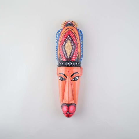 Handpainted Hanuman Gomira wooden mask featuring intricate carvings, bold colours, and traditional Indian folk art details on a plain background