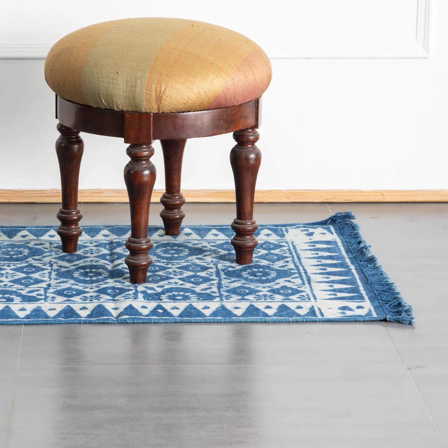Hand block printed indigo cotton floor runner rug with geometric floral motifs measuring 6 x 2 ft
