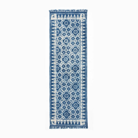 Handwoven indigo dhurrie rug featuring geometric, floral block printed motifs