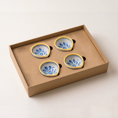 Open gift box showing 4 Jaipur Blue Pottery diyas