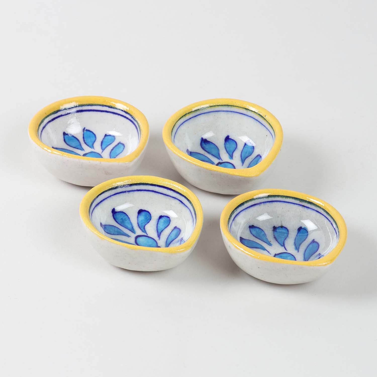 Angular view of Set of 4 handcrafted Jaipur Blue Pottery diyas