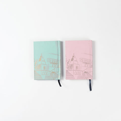 Back view of the Kashi handmade hardbound diary notebook set with green and pink covers.