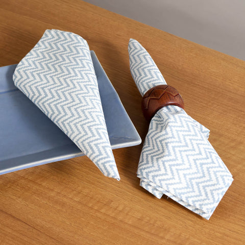 Cotton dining table napkins styled with dinnerware for elegant table styling and hosting