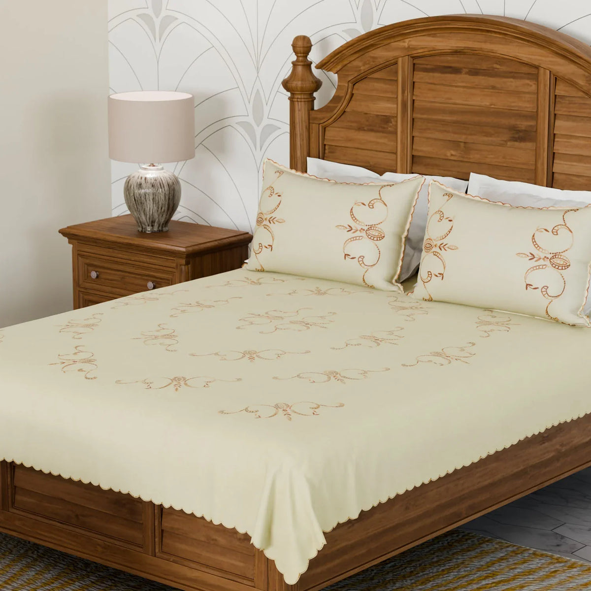 Light brown embroidered king-size bedcover with matching pillow cases styled in a bedroom, creating a warm and elegant setting
