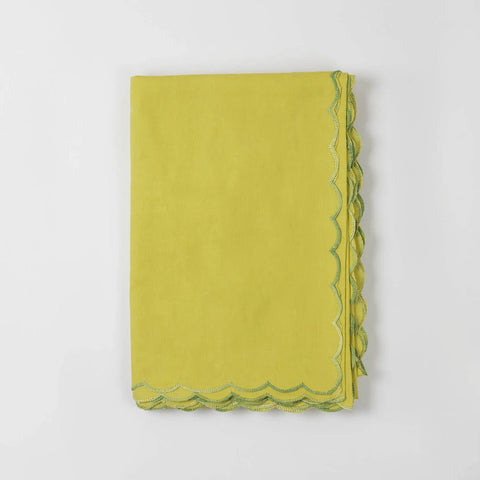 Folded view of a light green cotton bedcover featuring floral chikankari embroidery 