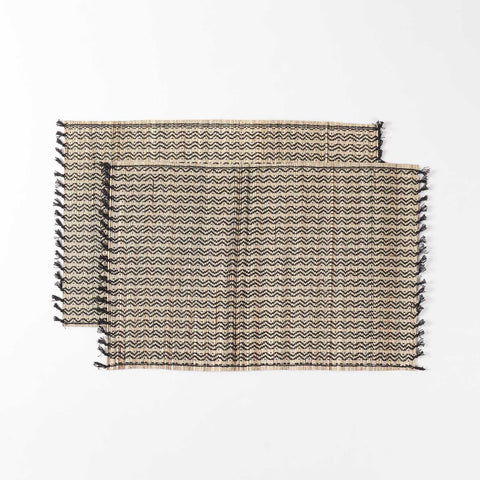 Set of 2 Madurkathi dining table placemats displayed flat, showcasing handwoven river grass texture and natural black colour combination
