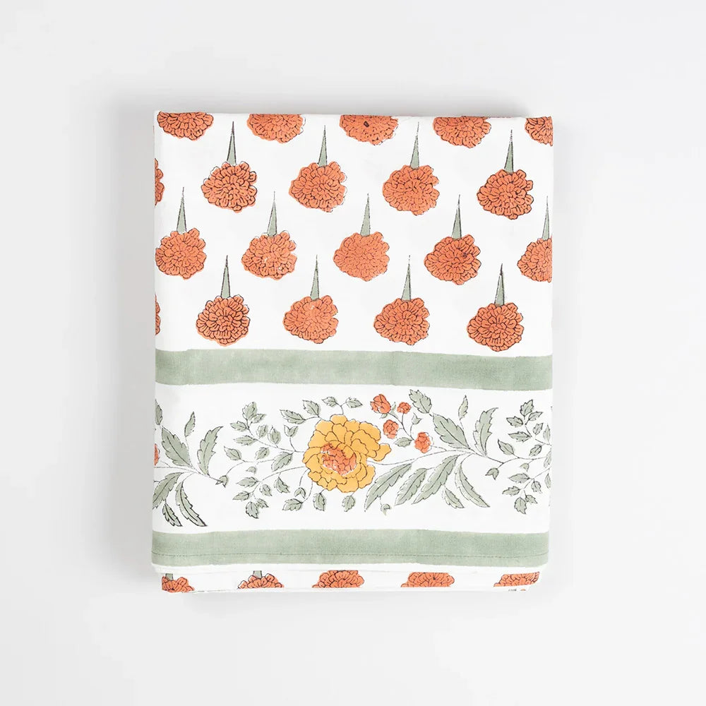Folded view of a block printed cotton bedcover highlighting craftsmanship and cotton sheeting texture