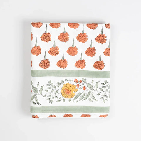 Folded view of a block printed cotton bedcover highlighting craftsmanship and cotton sheeting texture