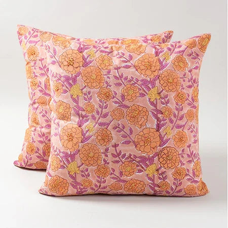 Set of 2 pink cushion covers of 16x 16 inches featuring marigold jaal hand block printed floral motifs in dark pink and orange