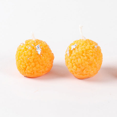 Set of 2 Motichoor Ladoo-shaped soy wax candles from the gift set