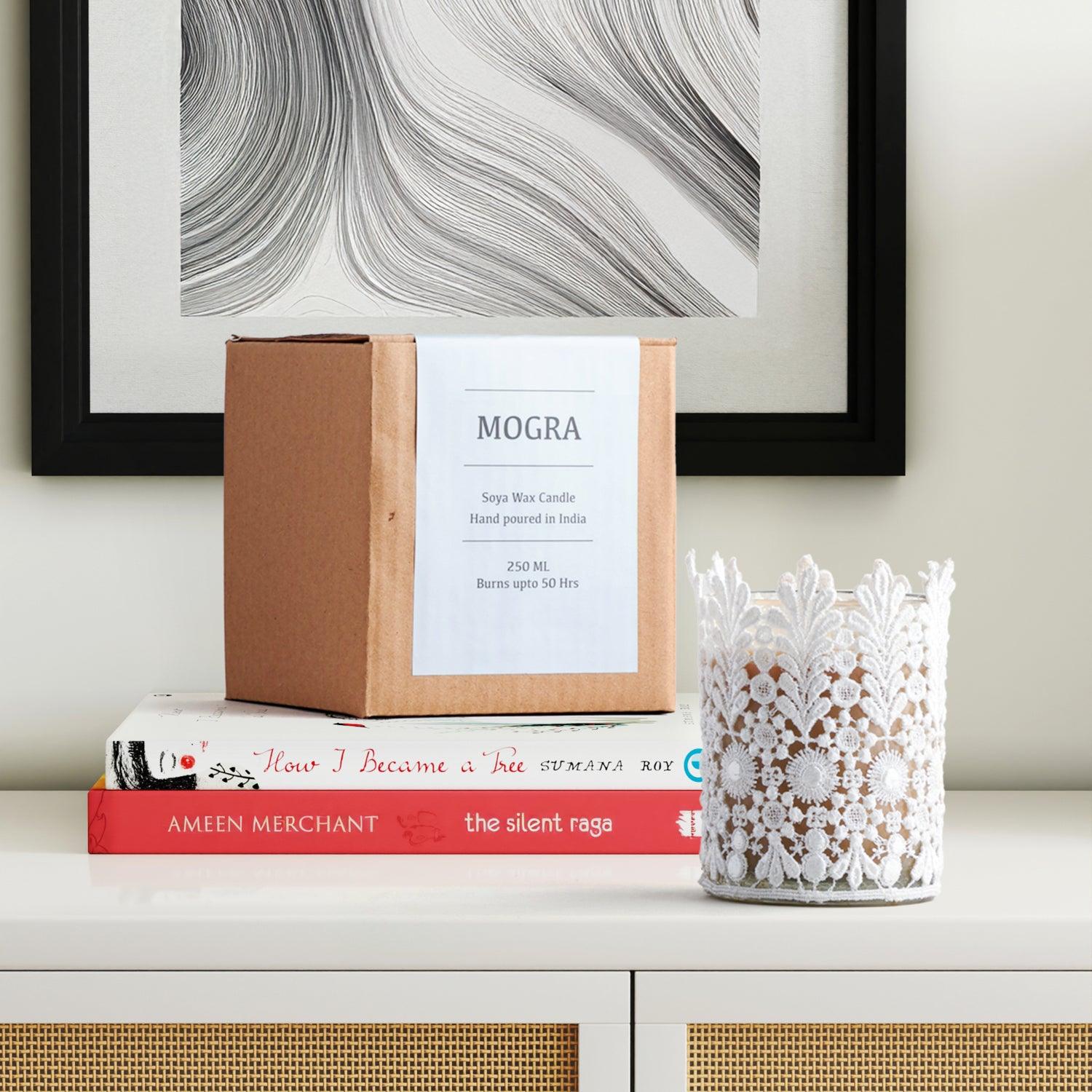 Handmade Mogra scented glass candle with a gift box for festive and special occasion gifting.
