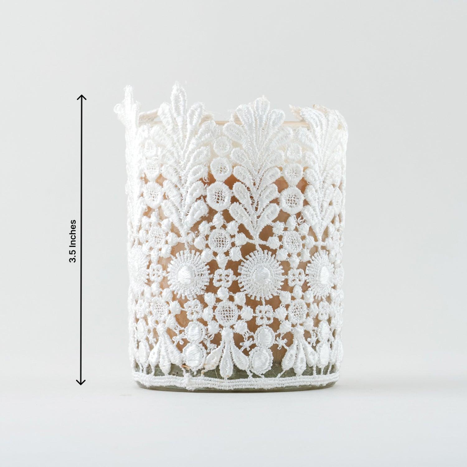 Dimensions of the handmade Mogra soy wax scented candle in a decorative lace glass votive.