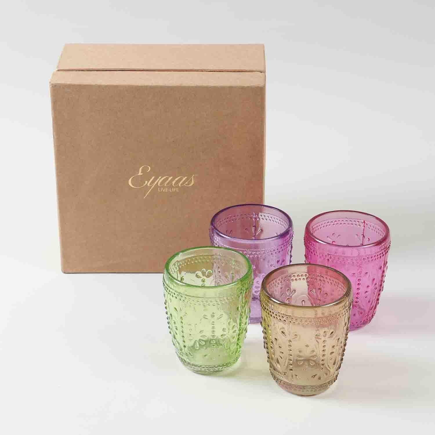 Gift-ready textured glass tumbler set of four, styled as a thoughtful housewarming gift