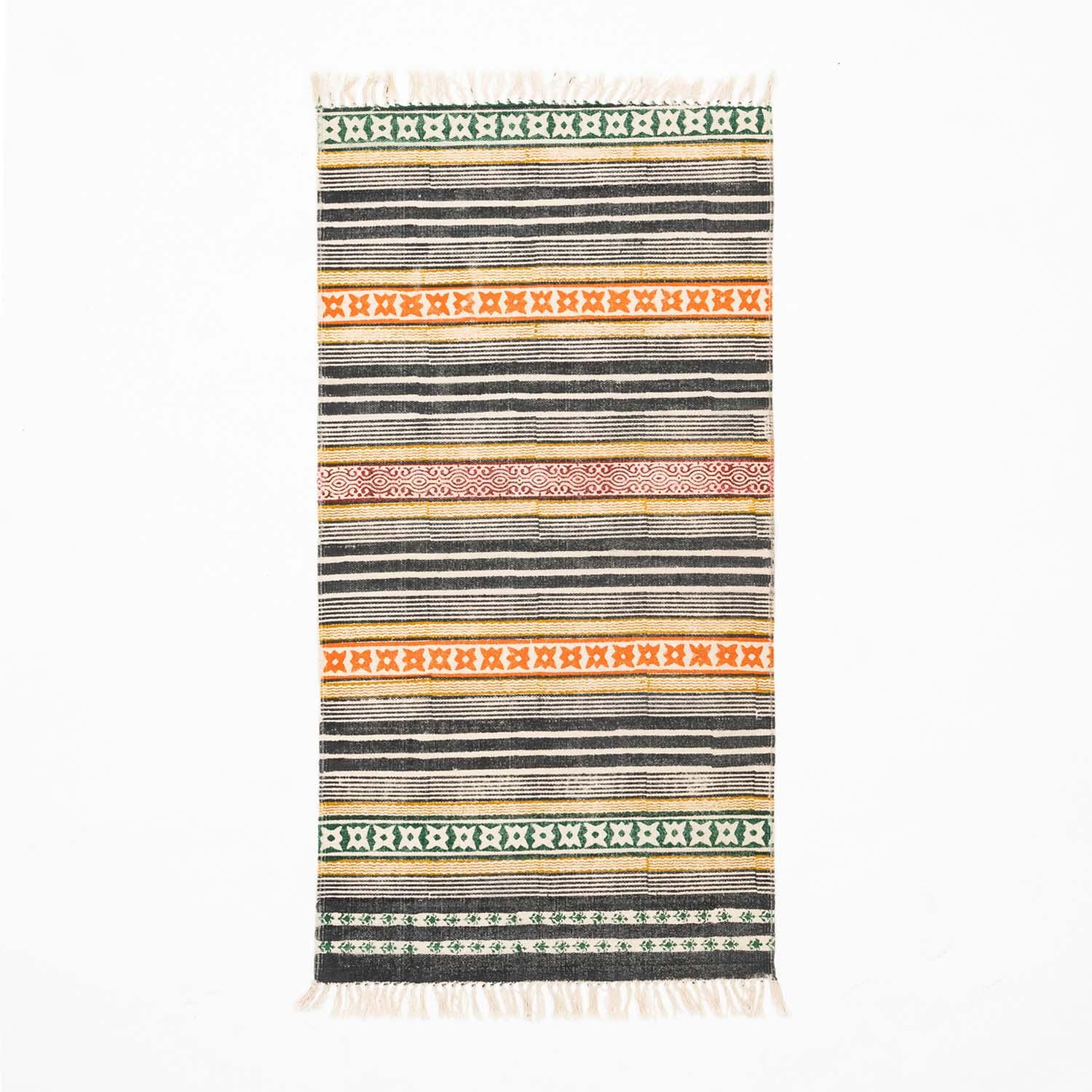 Handloom cotton dhurrie rug in multicolor featuring geometric stripe hand block printed patterns across the surface