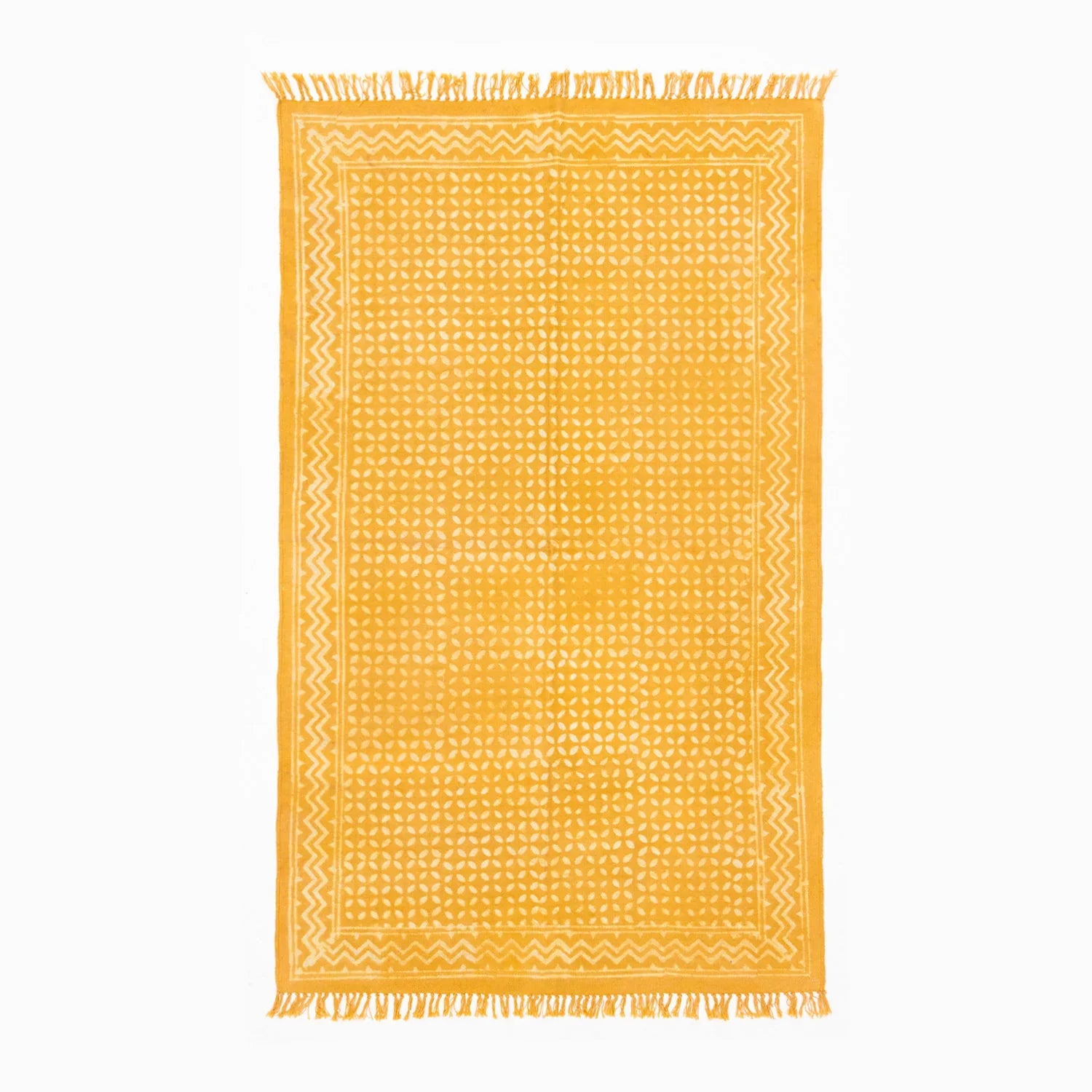 Handloom cotton dhurrie rug in mustard featuring geometric hand block printed patterns across the surface