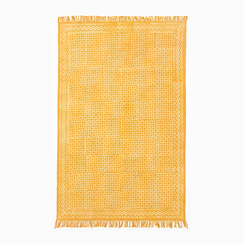 Full-size 6x4 ft cotton dhurrie featuring mustard geometric block print patterns and artisan craftsmanship