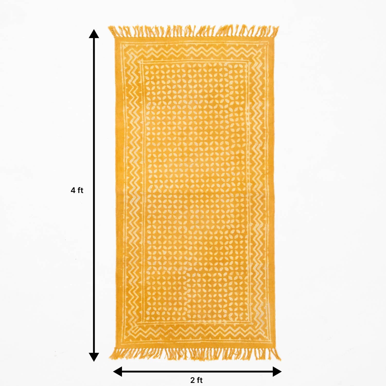 4 feet x 2 feet-sized handmade cotton rug  in mustard colour with geometric  block print design