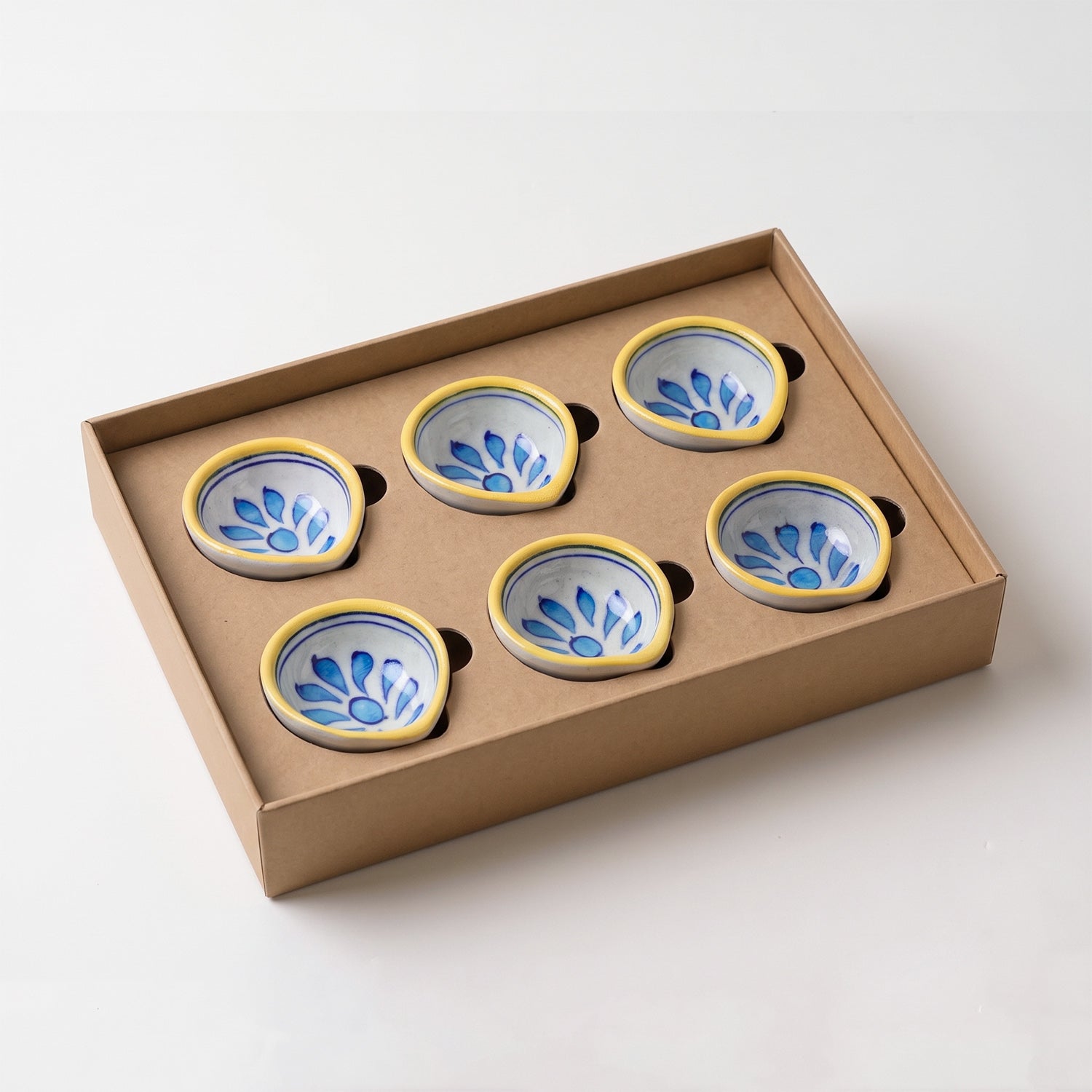 Open gift box showing 6 Jaipur Blue Pottery diyas